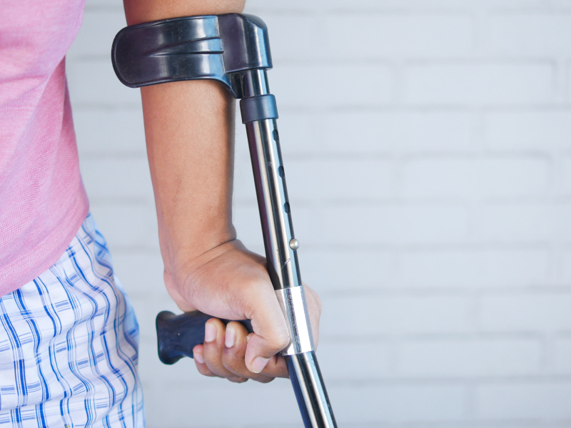 Person Holding Stand in his Hands